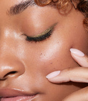 Hannah wears Continuum Gel Eyeliner in Gamma Ray