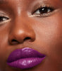 make beauty model wearing serum balm intense in orchid fever 