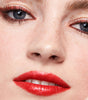 model wearing tinted lip balm in shock layer 